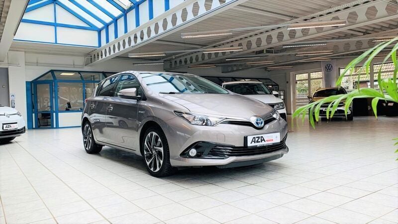Grau Gebraucht 2016 Toyota Auris Hybrid Design Limousine | 12.990 € (Fairer Preis) - Bild 1/4