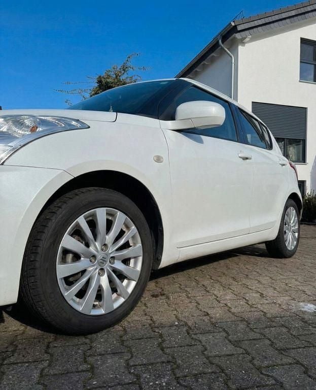 Gebraucht Suzuki Swift X-TRA 94 PS (69 kW) 2013 Weiß Kleinwagen