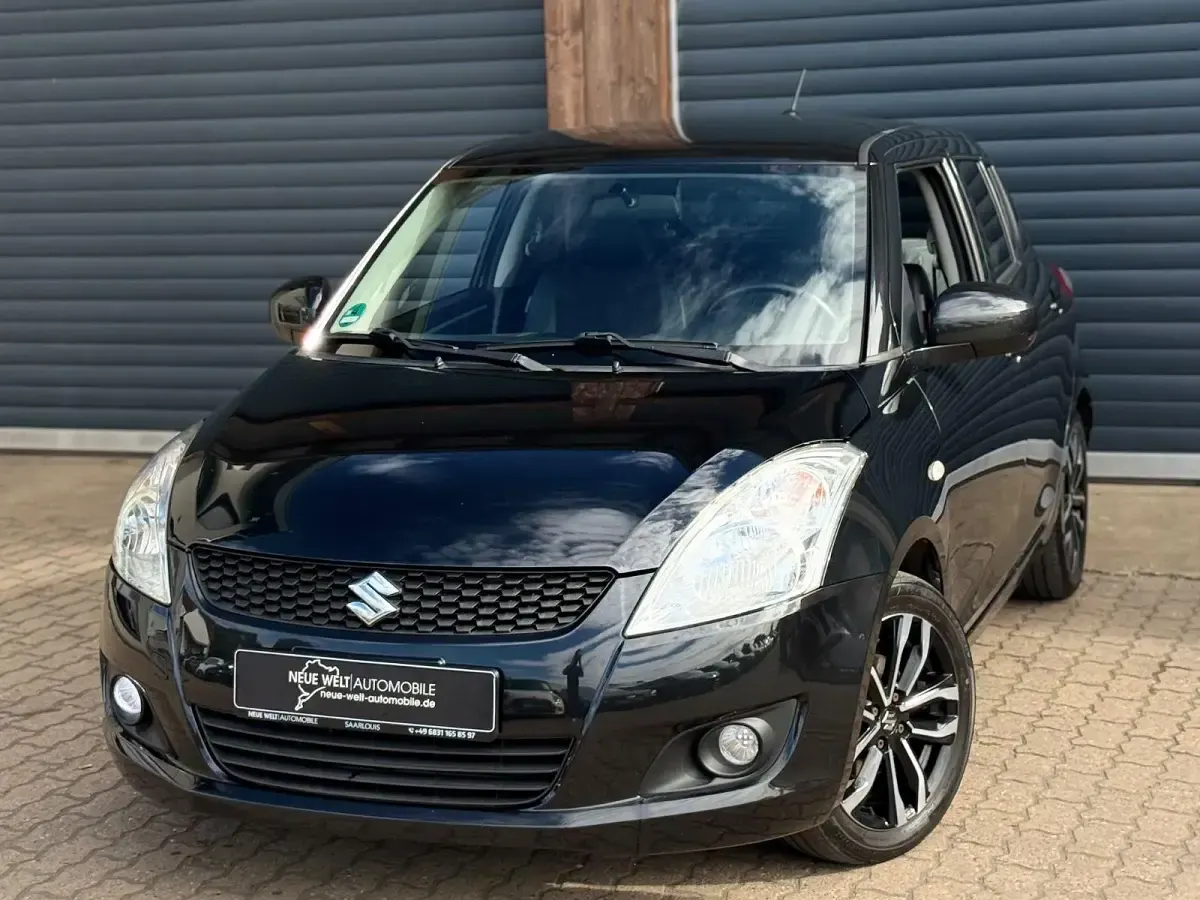Gebraucht Suzuki Swift 94 PS (69 kW) 2015 Schwarz Kleinwagen