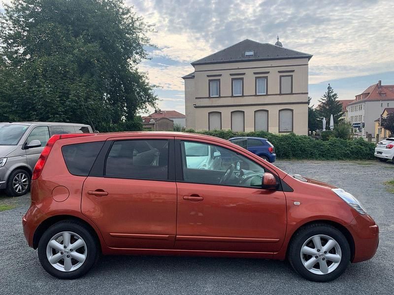 Second-hand Nissan Note Acenta 88 CP (64 kW) 2008 Portocaliu Berlinǎ