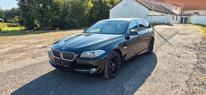 Gebraucht BMW 520 184 PS (135 kW) 2011 Schwarz Kombi
