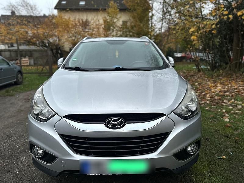 Silber Gebraucht 2012 Hyundai Tucson SUV | 13.250 € - Bild 1/4
