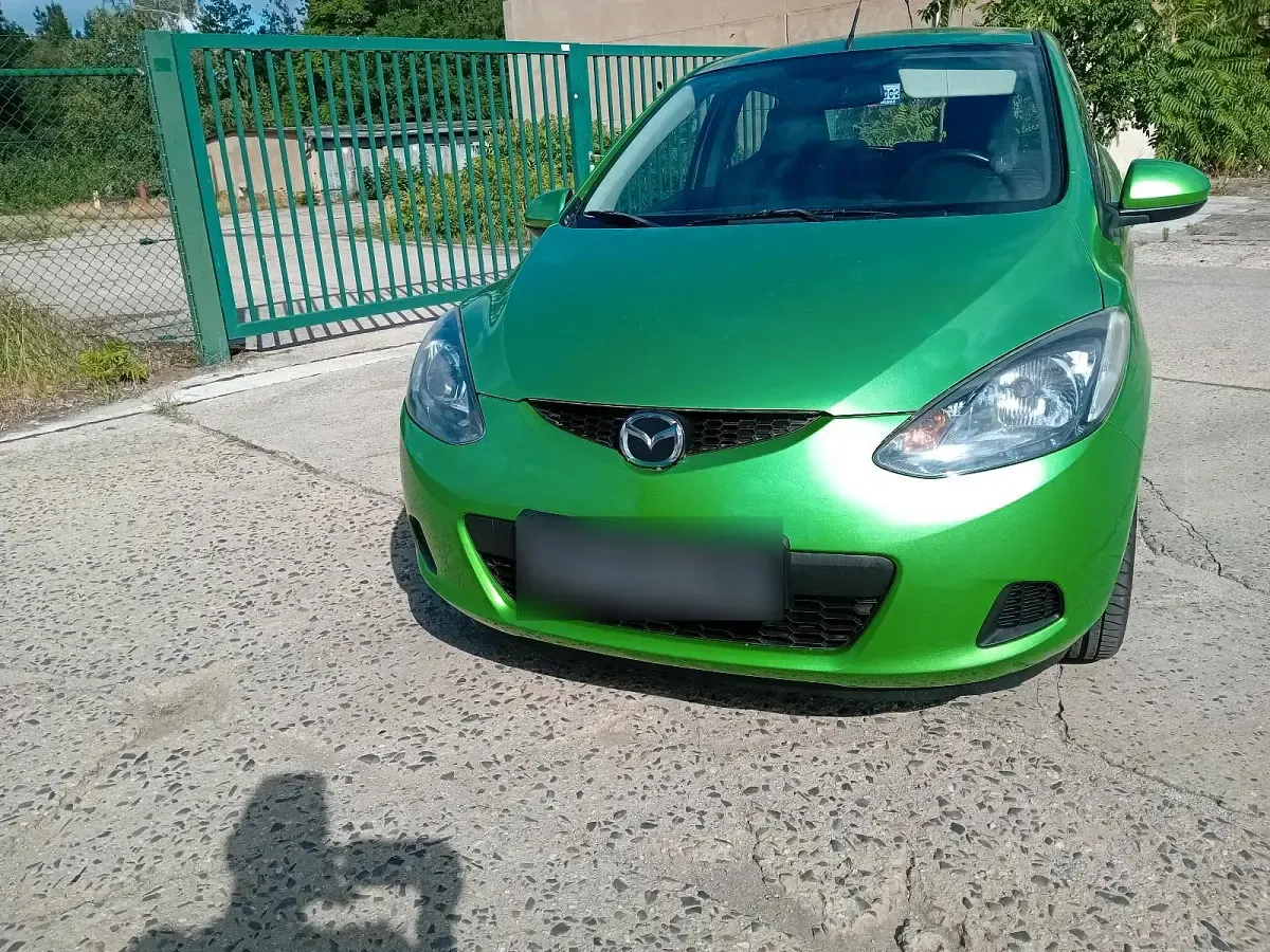 Gebraucht Mazda 2 75 PS (55 kW) 2009 Grün Kleinwagen