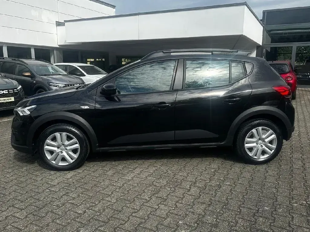 Gebraucht Dacia Sandero Expression 101 PS (74 kW) 2024 Perlmuttschwarz Limousine