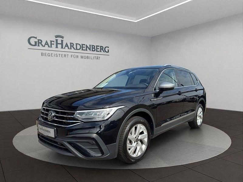 Schwarz Gebraucht 2024 VW Tiguan Allspace Life SUV | 29.888 € (Superpreis) - Bild 1/4