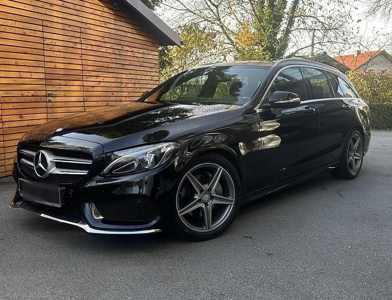 Schwarz Gebraucht 2015 Mercedes C180 AMG line Kombi | 16.799 € (Fairer Preis) - Bild 1/4