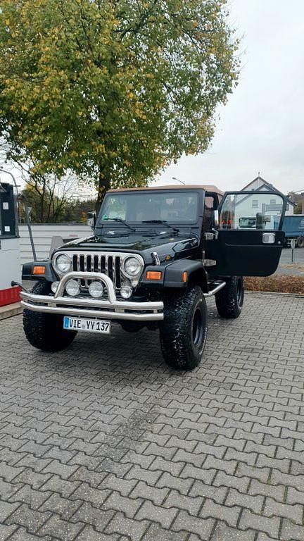 Schwarz Gebraucht 2000 Jeep Wrangler Sahara SUV | 27.500 € - Bild 1/4