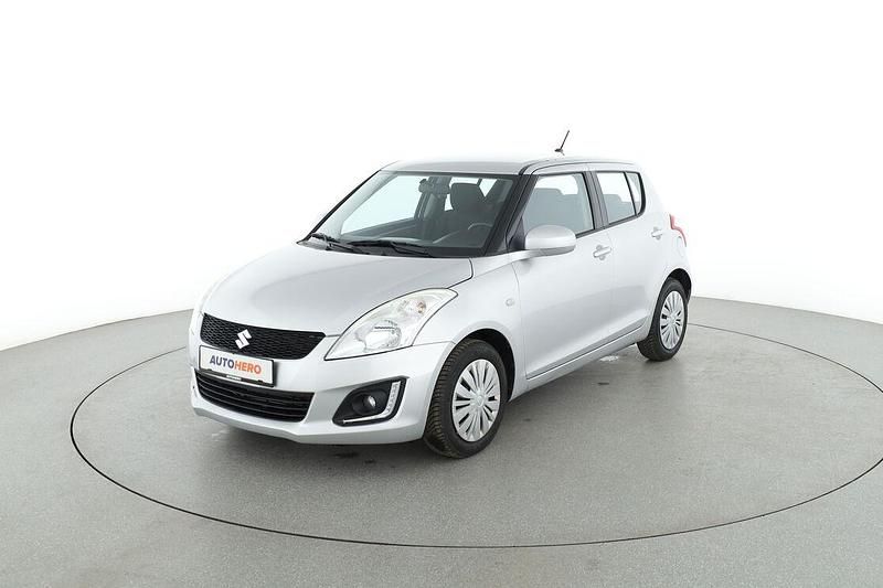 Grau Gebraucht 2017 Suzuki Swift Comfort Limousine | 10.390 € - Bild 1/3