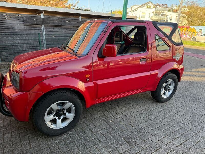 Rot Gebraucht 2008 Suzuki Jimny SUV | 13.900 € (Teuer) - Bild 1/4