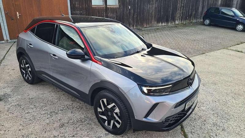 Gebraucht Opel Mokka-e GS Line 100 kW (136 PS) 2023 Artense/ dach &haube schwarz SUV