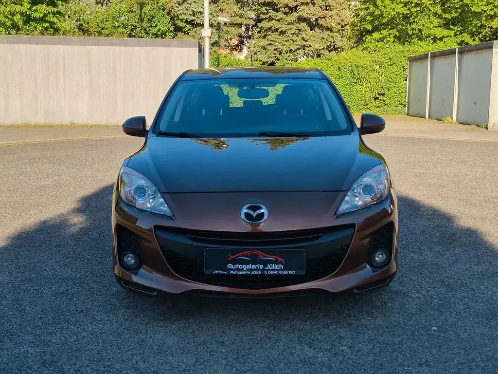 Second-hand Mazda 3 Edition 105 CP (77 kW) 2012 Maro Berlinǎ
