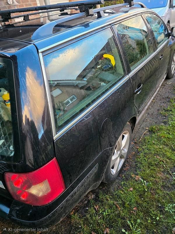 Gebraucht VW Passat 131 PS (96 kW) 2004 Schwarz Kombi