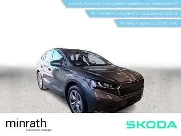 Grau Gebraucht 2023 Skoda Enyaq iV Loft SUV | 23.239 € - Bild 1/4