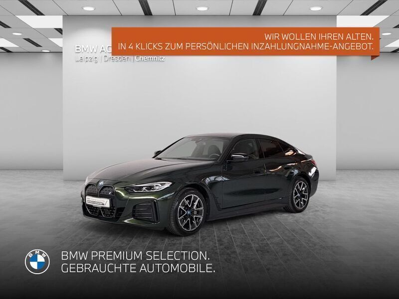 Grün Gebraucht 2023 BMW i4 Efficient Dynamics Limousine | 40.906 € (Guter Preis) - Bild 1/4
