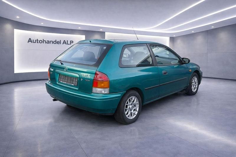Gebraucht Mazda 323 Comfort 88 PS (64 kW) 1998 Grün Limousine