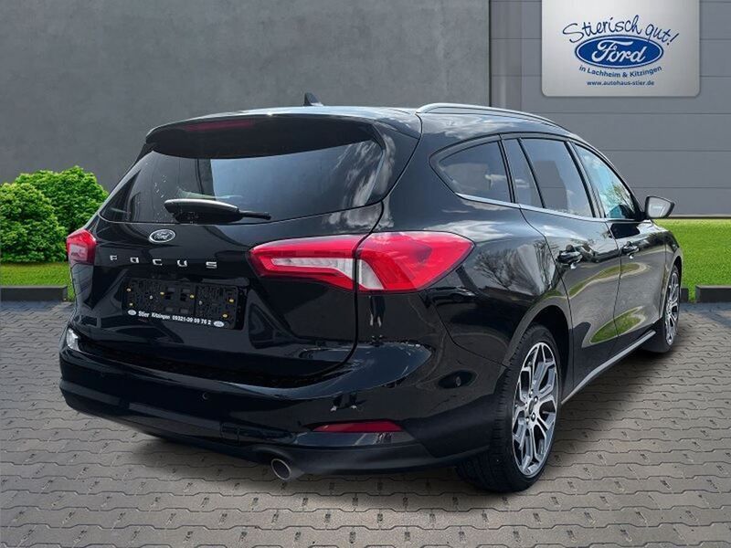 Gebraucht Ford Focus Titanium 125 PS (91 kW) 2019 Iridiumschwarz metallic Kombi