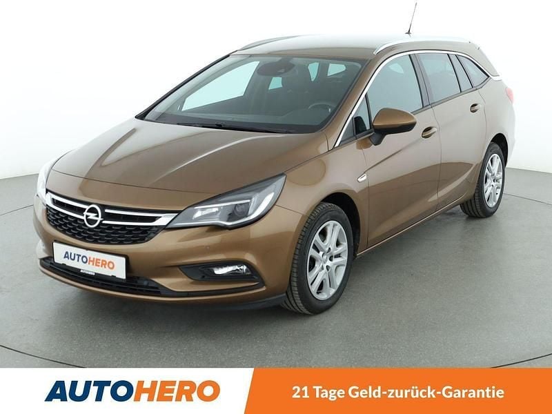Braun Gebraucht 2016 Opel Astra Edition Kombi | 11.890 € (Fairer Preis) - Bild 1/3