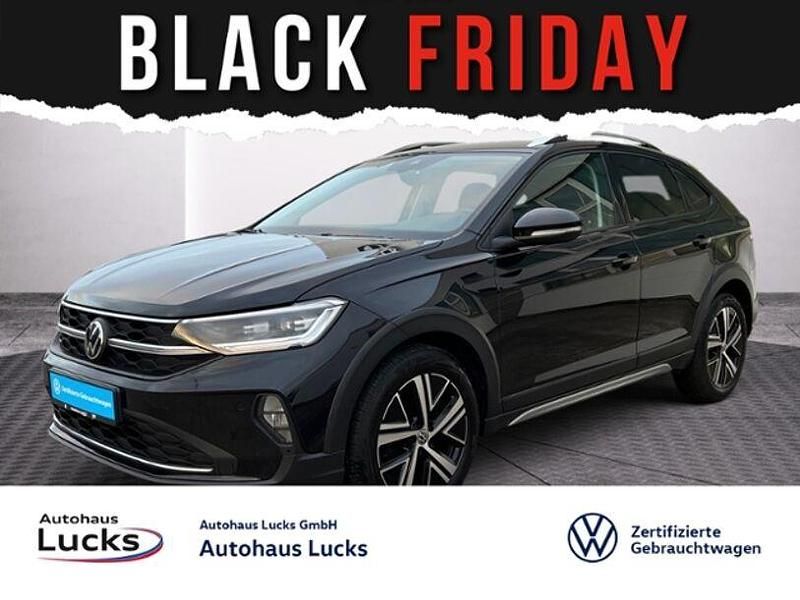 Deep black perleffekt (metallic) Gebraucht 2021 VW Taigo Style SUV | 19.367 € (Fairer Preis) - Bild 1/4