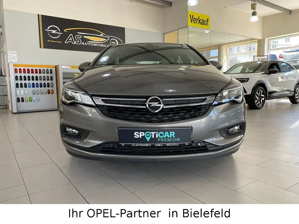 Gebraucht Opel Astra Edition 125 PS (91 kW) 2015 Cool beige (metallic) Limousine
