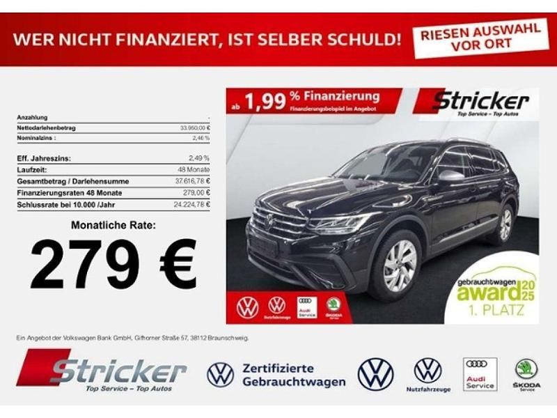Deep black perleffekt (metallic) Gebraucht 2024 VW Tiguan Allspace Life SUV | 33.949 € (Superpreis) - Bild 1/3