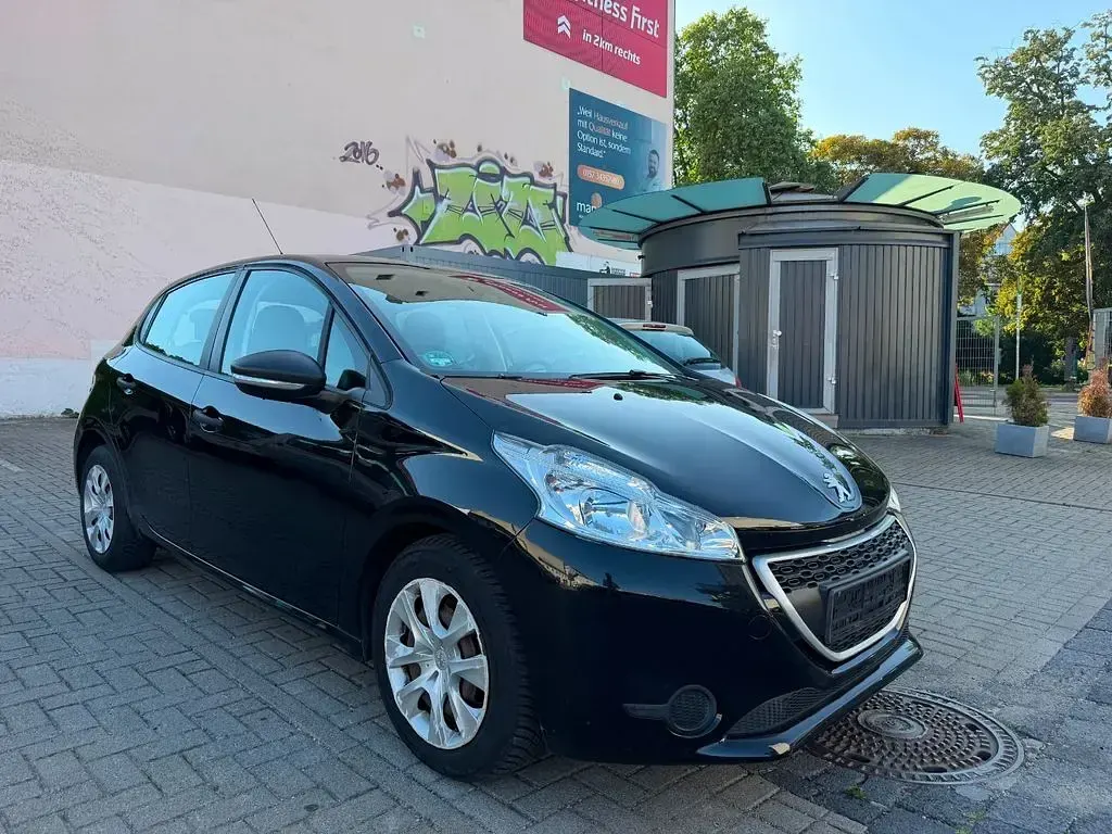 Gebraucht Peugeot 208 Access 68 PS (50 kW) 2013 Schwarz Kleinwagen