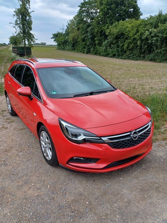 Rot Gebraucht 2016 Opel Astra Kombi | 9.999 € (Etwas zu teuer) - Bild 1/4