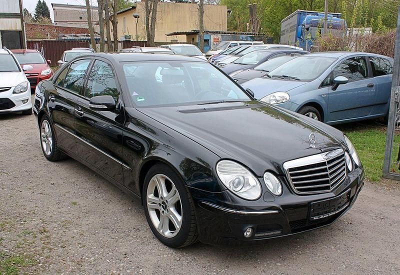 Second-hand Mercedes E200 163 CP (119 kW) 2008 Negru Berlinǎ