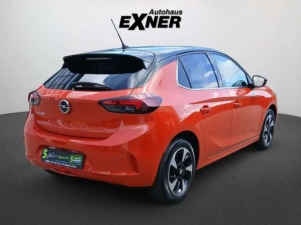 Gebraucht Opel Corsa-e Elegance 100 kW (136 PS) 2022 Power orange / dach schwarz Kleinwagen