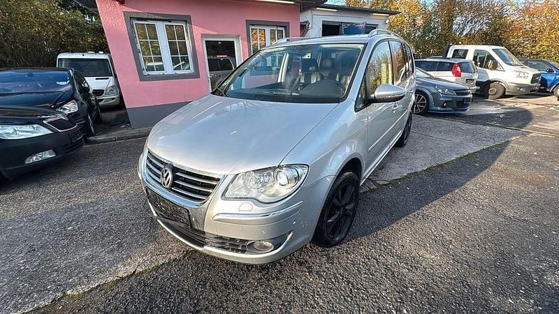 Silber Gebraucht 2010 VW Touran Highline Van / Kleinbus | 3.500 € - Bild 1/4