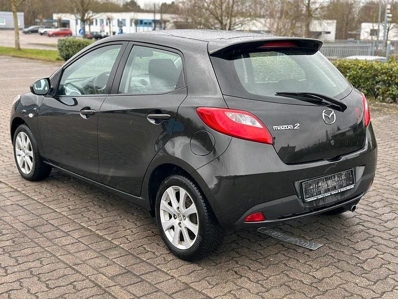Gebraucht Mazda 2 75 PS (55 kW) 2010 Schwarz Kleinwagen
