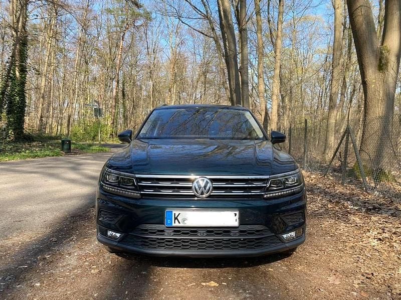 Grün Gebraucht 2017 VW Tiguan Sound SUV | 23.900 € (Fairer Preis) - Bild 1/4