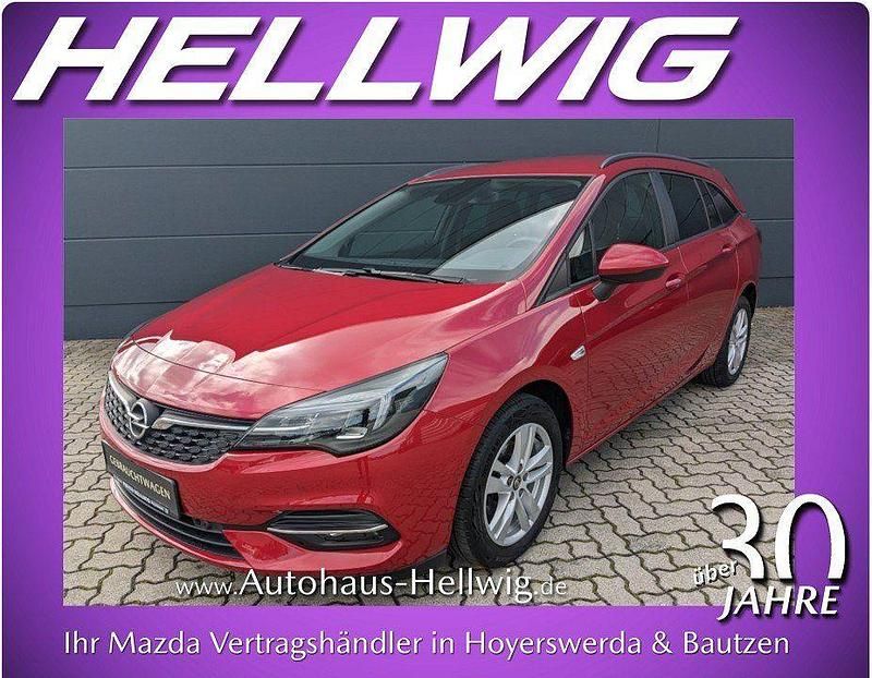 Chili rot/kardio rot metallic (metallic) Gebraucht 2021 Opel Astra Edition Kombi | 13.380 € (Fairer Preis) - Bild 1/4