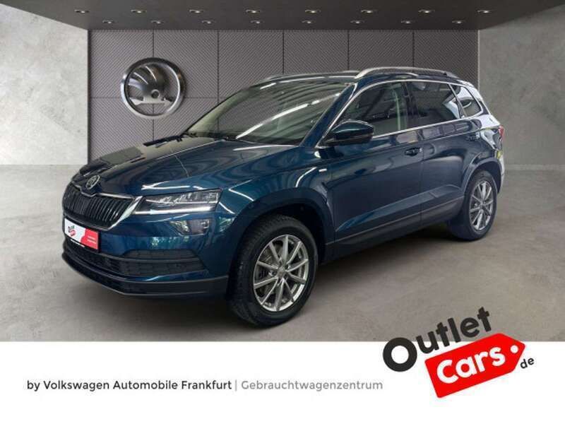 Lavablau metallic Gebraucht 2021 Skoda Karoq Ambition SUV | 21.480 € (Superpreis) - Bild 1/3