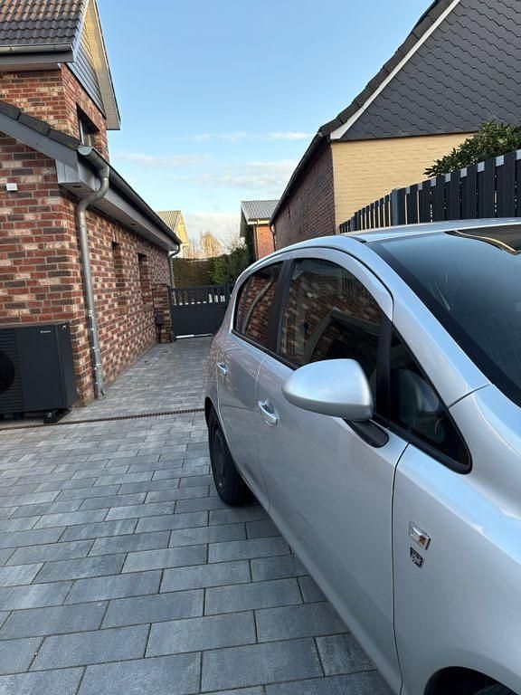 Używany Opel Corsa Selection 87 KM (63 kW) 2010 Szary Hatchback