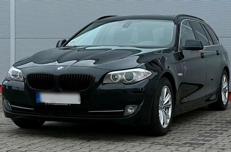 Gebraucht BMW 520 184 PS (135 kW) 2011 Schwarz Kombi