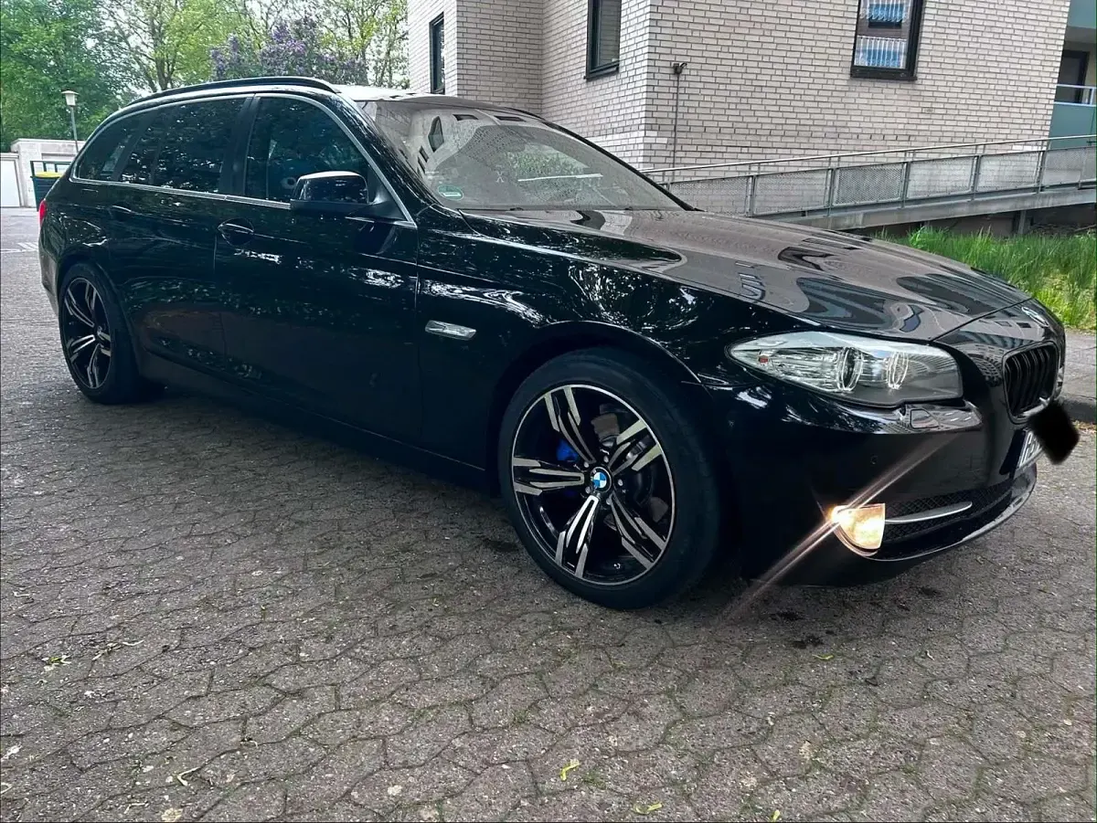 Gebraucht BMW 520 186 PS (136 kW) 2011 Schwarz Kombi