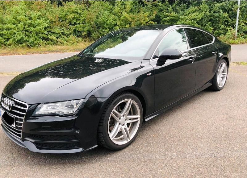 Schwarz Gebraucht 2013 Audi A7 Sportback Business Kleinwagen | 22.750 € (Teuer) - Bild 1/4