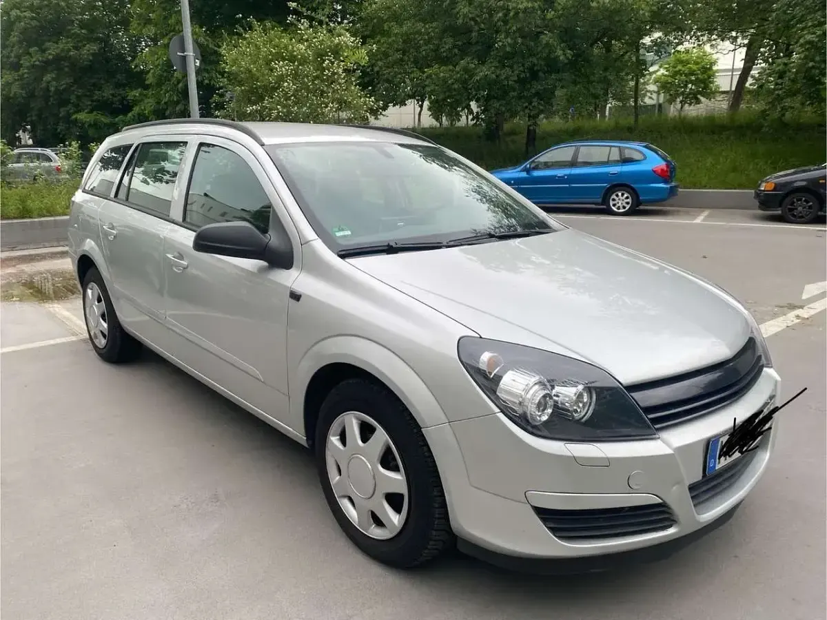 Używany Opel Astra 125 KM (91 kW) 2005 Szary Kombi