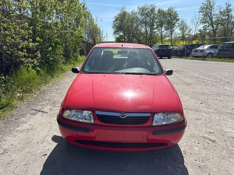 Second-hand Mazda 121 75 CP (55 kW) 1998 Roșu Hatchback