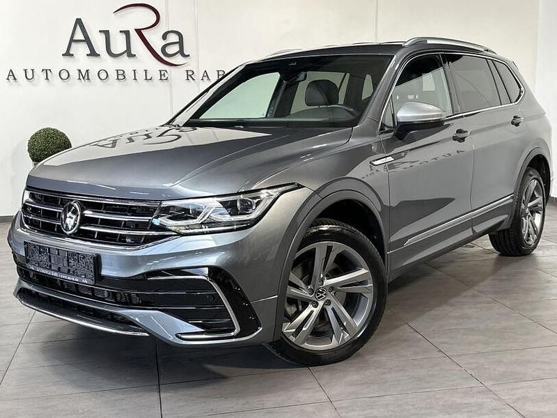 Platinum grey Gebraucht 2024 VW Tiguan Allspace R-line SUV | 43.749 € (Fairer Preis) - Bild 1/4