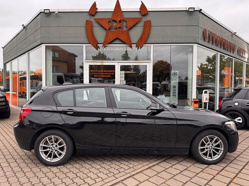Schwarz Gebraucht 2014 BMW 116 Comfort Edition Kleinwagen | 12.950 € (Fairer Preis) - Bild 1/4
