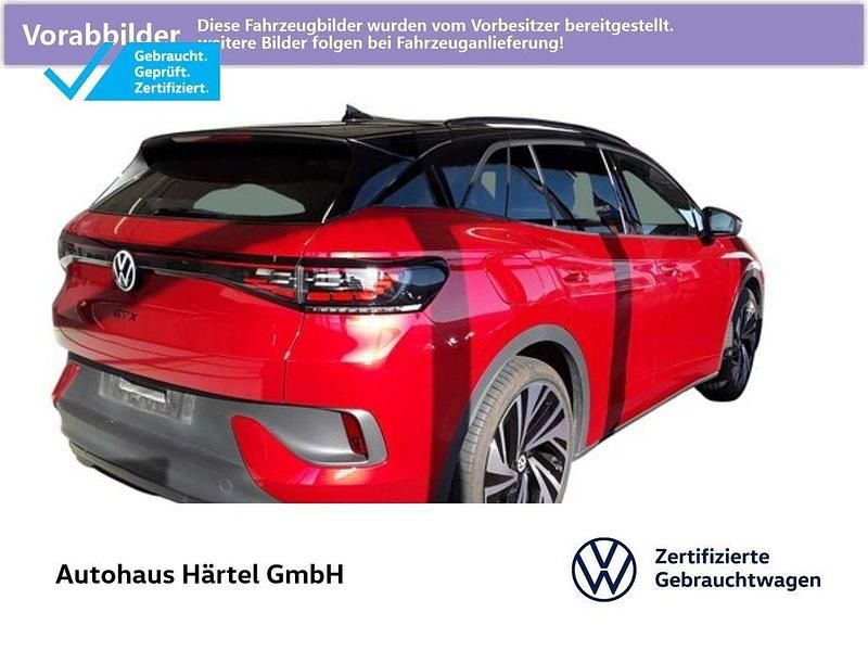 Kings red, metallic Gebraucht 2025 VW ID.4 GTX SUV | 45.700 € (Fairer Preis) - Bild 1/4