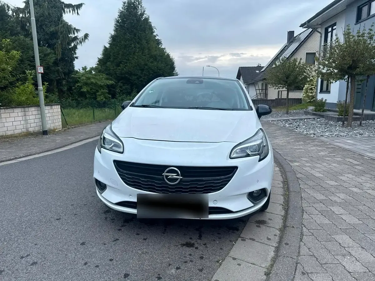 Gebraucht Opel Corsa 101 PS (74 kW) 2014 Weiß Kleinwagen