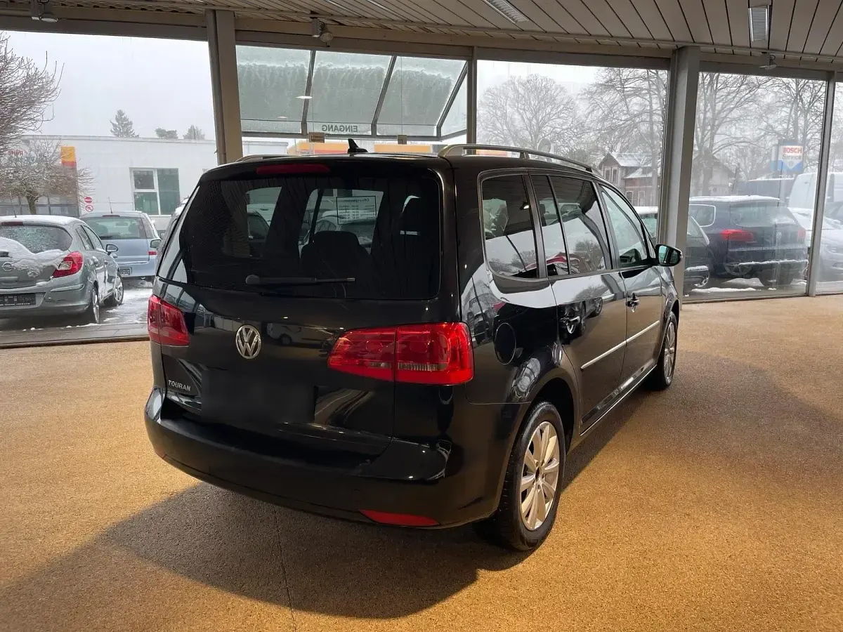 Gebraucht VW Touran 77 PS (56 kW) 2011 Schwarz Van / Kleinbus