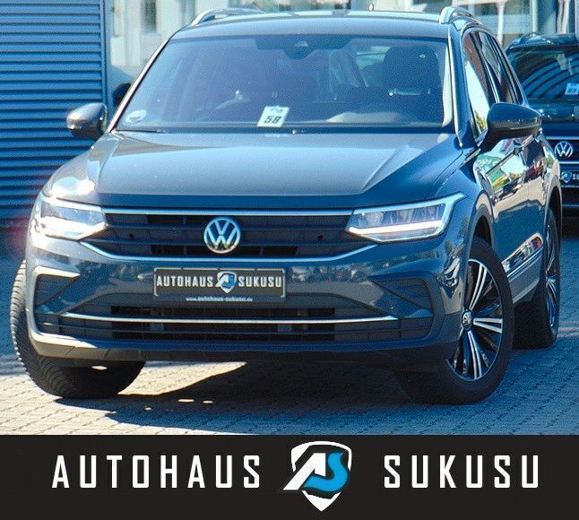 Uranograu Gebraucht 2023 VW Tiguan Active SUV | 21.990 € (Superpreis) - Bild 1/4