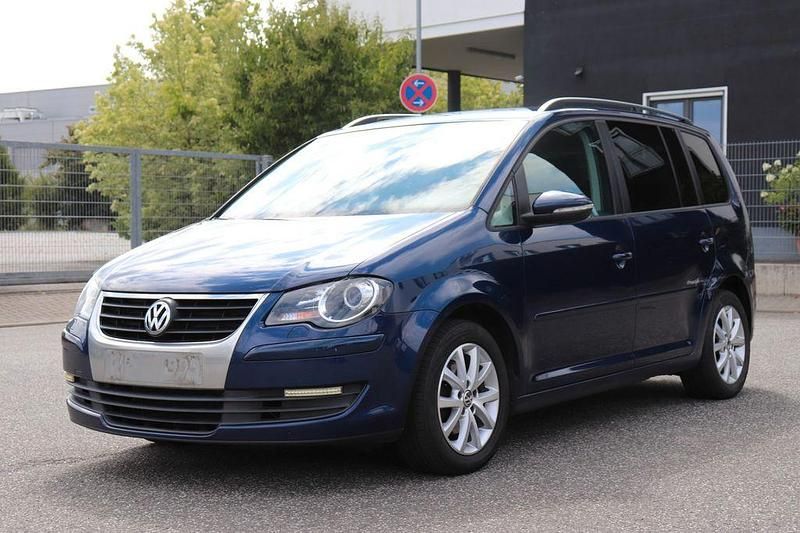 Blau Gebraucht 2010 VW Touran Freestyle Van / Kleinbus | 3.490 € (Fairer Preis) - Bild 1/4