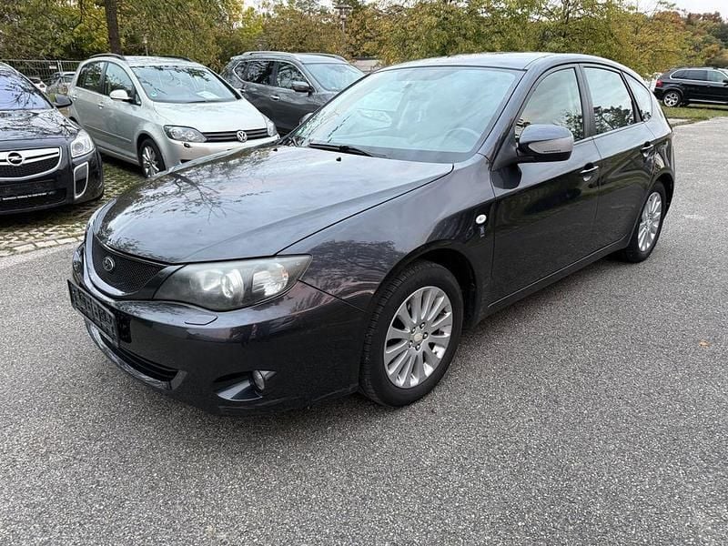 Grau Gebraucht 2010 Subaru Impreza Comfort SUV | 3.990 € (Superpreis) - Bild 1/4