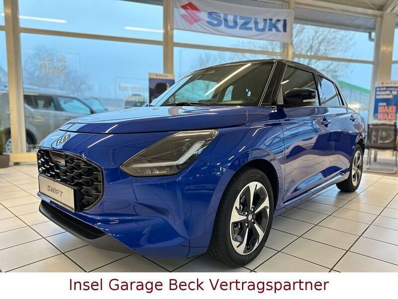 Blau Neu 2025 Suzuki Swift Comfort+ Limousine | 21.999 € - Bild 1/4