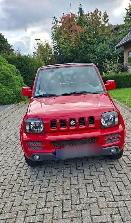 Rot Gebraucht 2010 Suzuki Jimny SUV | 9.500 € (Fairer Preis) - Bild 1/4