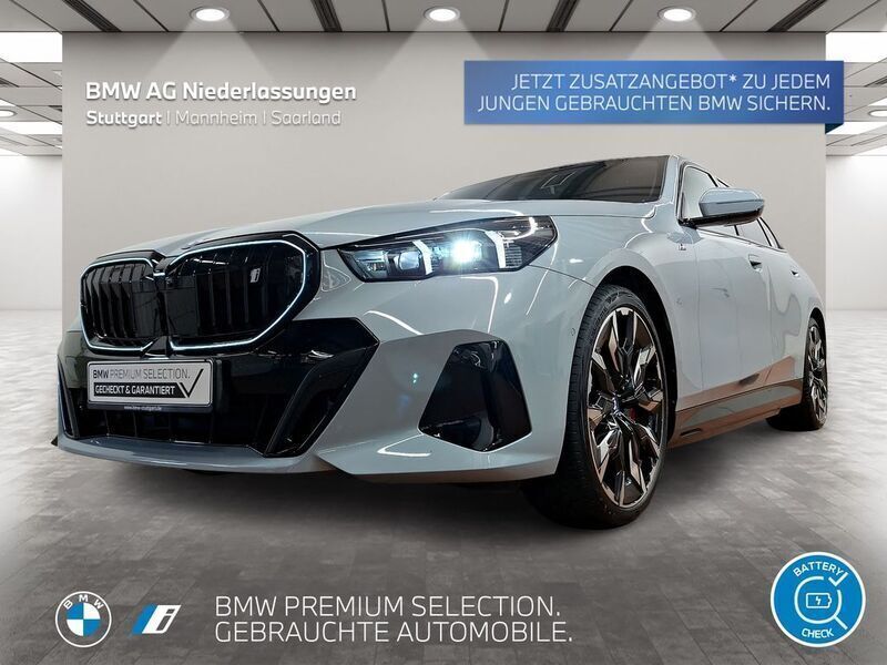 Grau Gebraucht 2024 BMW i5 Comfort Edition Limousine | 64.550 € - Bild 1/1